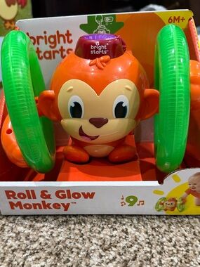 Bright Starts Orange Monkey Toy with Green Light-Up Rings